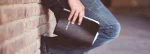 holding Bible